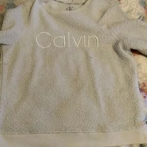 Calvin Klein sweater, size medium, it's white